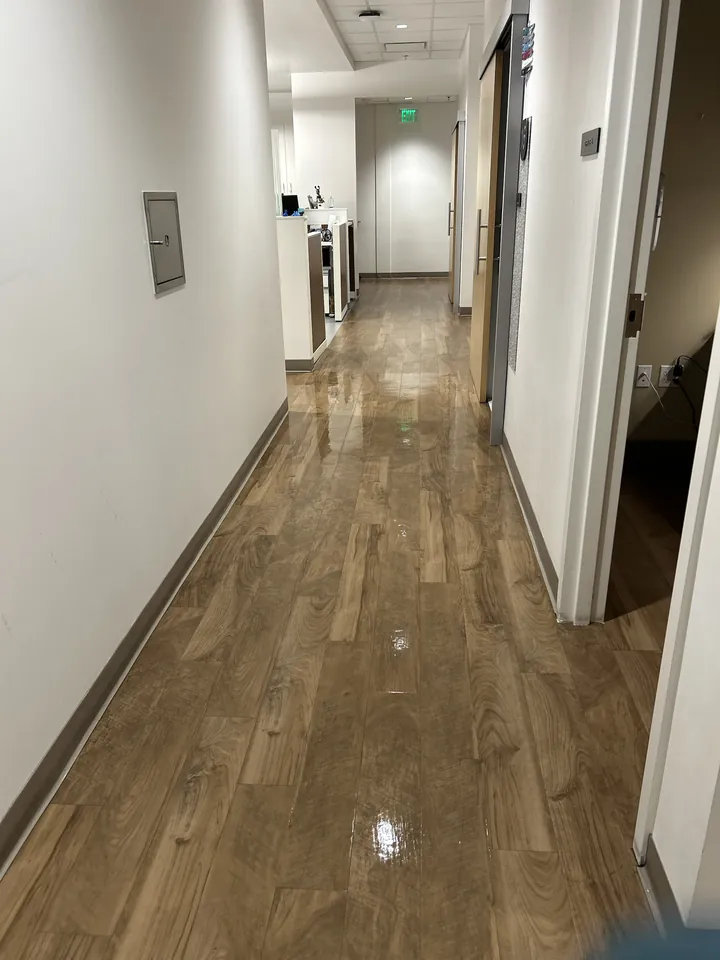 Freshly polished hallway floor at a medical office