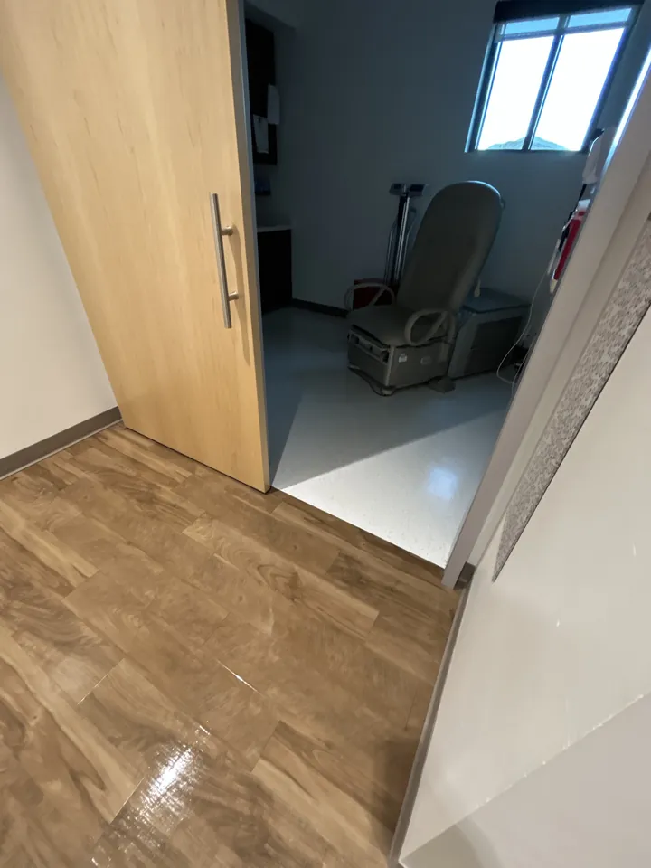 Clean exam room with a spotless floor