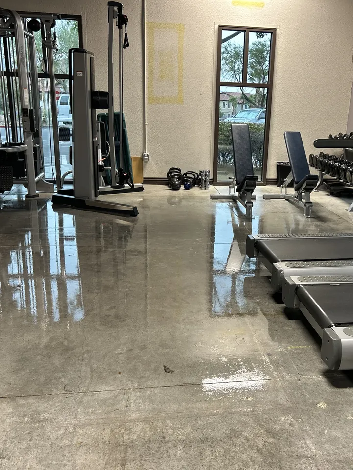 Freshly mopped fitness center floor